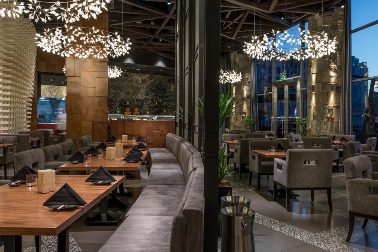 แอดเดรส ดาวน์ทาวน์ Hotel ดูไบ ภายนอก รูปภาพ The interior of the restaurant